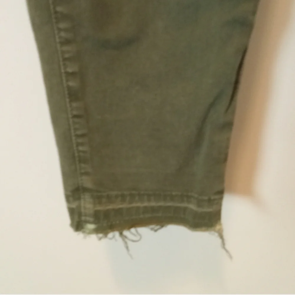 J brand olive green Jungle jeans distressed knees raw edge